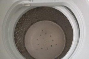 洗衣机脱桶转不动解决方法（如何处理洗衣机转桶卡住的问题）